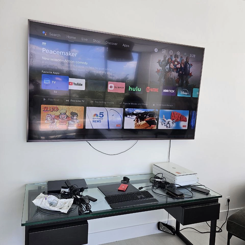 Clean cable management with wall-mounted TV setup