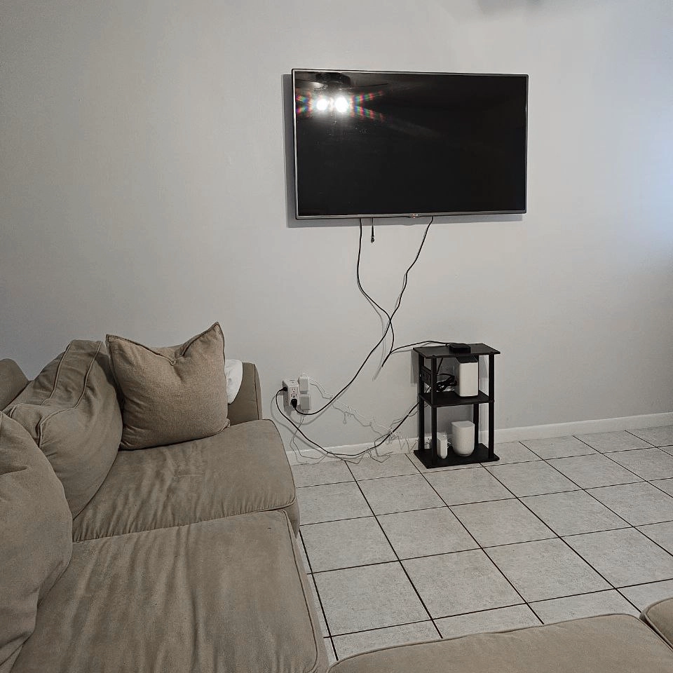 Flat screen TV mounting with floating TV stand