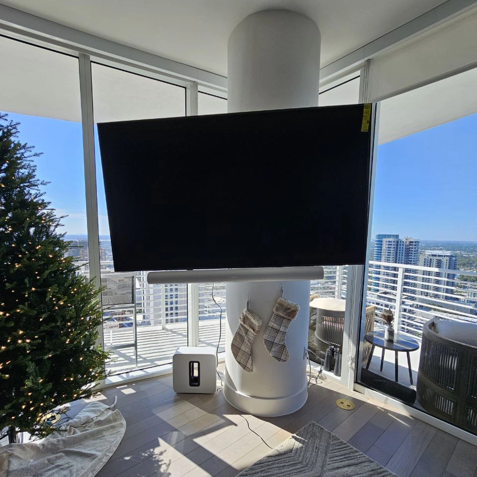 Soundbar mounted under TV with clean cable management